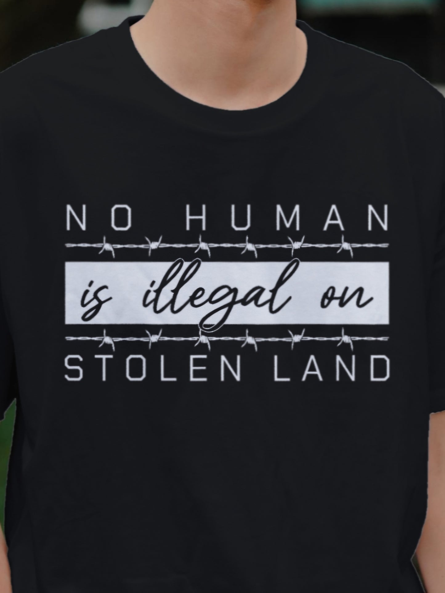 NO HUMAN IS ILLEGAL ON STOLEN LAND - Unisex